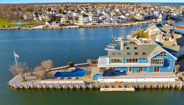 Manasquan Insurance on a home and dock, advising on flood and bulkhead coverage