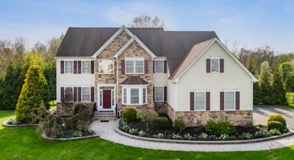 Hillsborough Insurance agent reviewing a home’s layout and surroundings