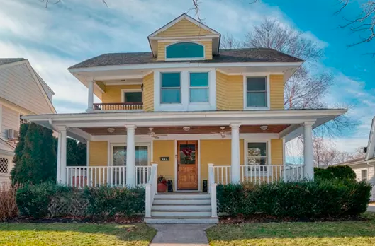 Elevated coastal residence in Allenhurst with storm‑ready shutters