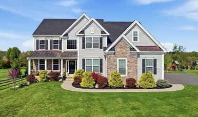 Brick Victorian home on Flemington’s historic courthouse circle with mature trees
