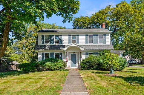 Hopewell property with guest cottage and landscaped terraces