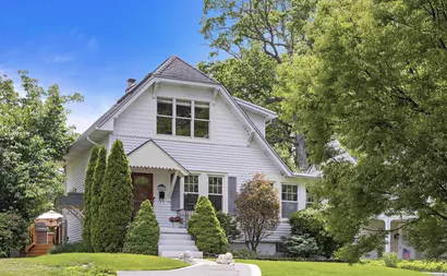 Modest single‑family home in Interlaken with fenced backyard and patio
