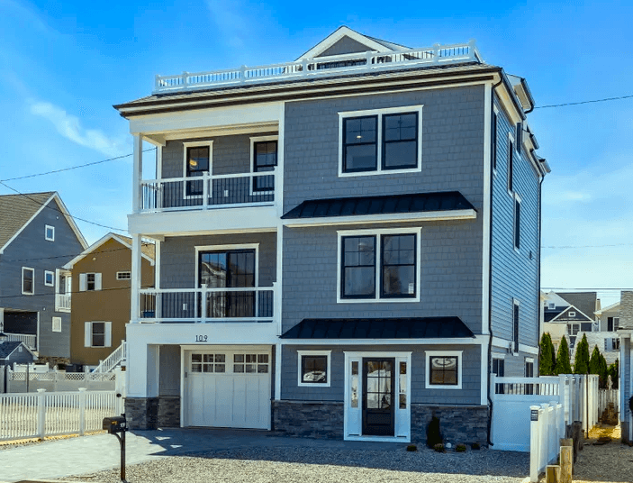 Ocean City oceanfront Victorian with wraparound porch and boardwalk nearby