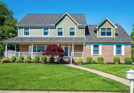Ocean Township suburban residence with mature trees and reinforced roof