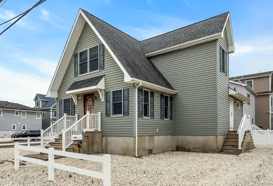 Ortley Beach beachfront bungalow on pilings with private stair and dune view