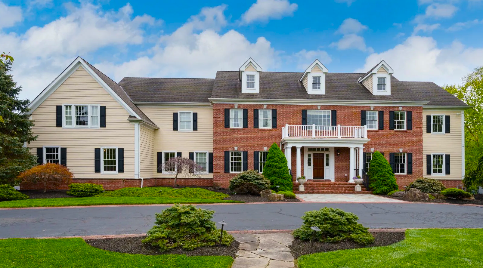 Pennington townhouse near village green with brick facade