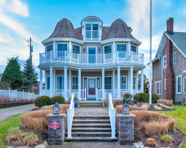 Classic Sea Girt shingle‑style beach house with coastal landscaping