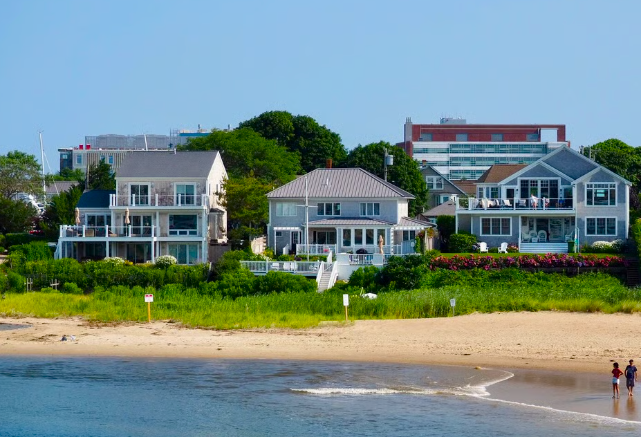 Sea Girt colonial near the boardwalk with manicured lawn and white trim