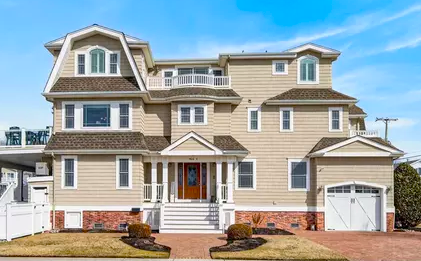 Sea Isle City raised beach house with dune fencing and ocean view