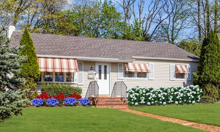 Beautiful tree-lined residential street with luxury homes in Spring Lake New Jersey