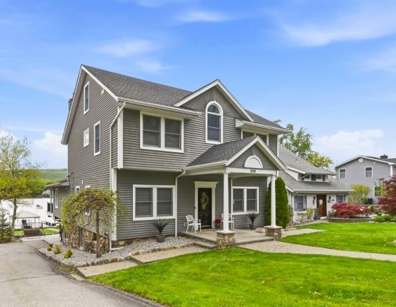 Ranch‑style home near West Milford park with landscaped yard and patio