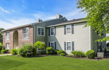 Local independent agent providing a face-to-face policy review with a client